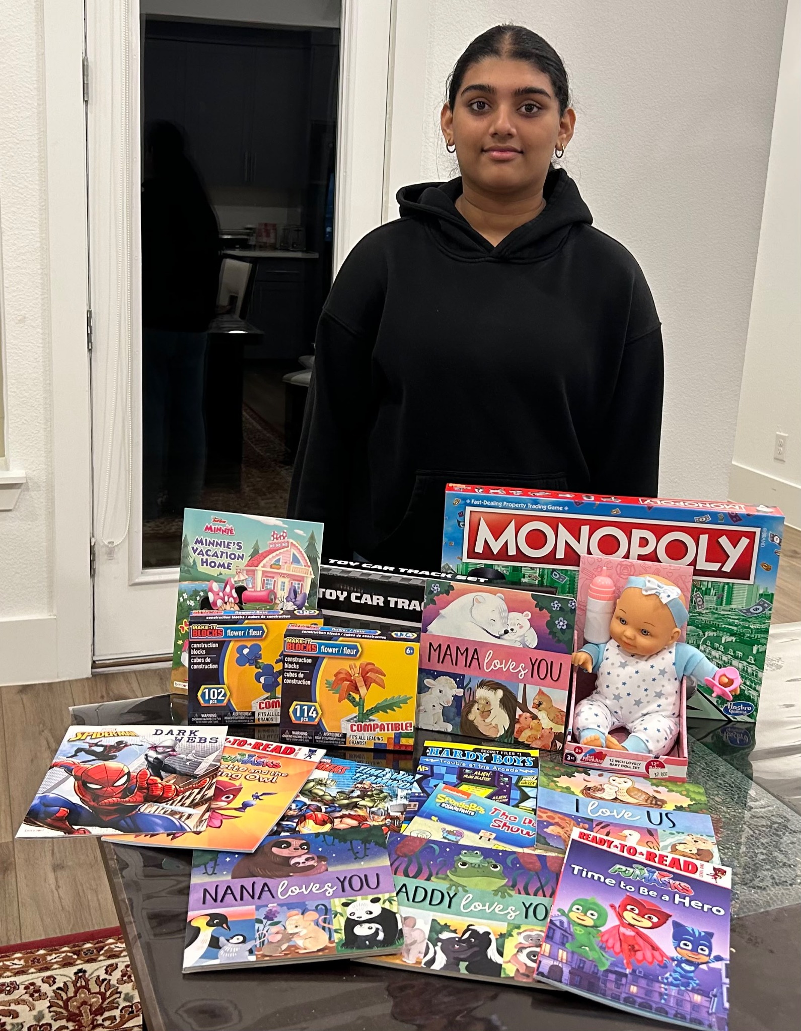Books, toys, and games donated to an existing donation drive